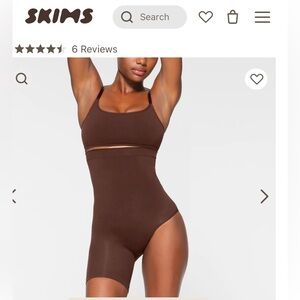 SKIMS shapeware. Coverage on right thigh with left leg side open